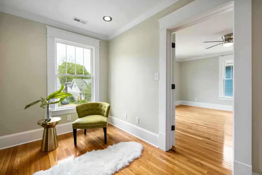 Interior room painted in warm grey with white trim